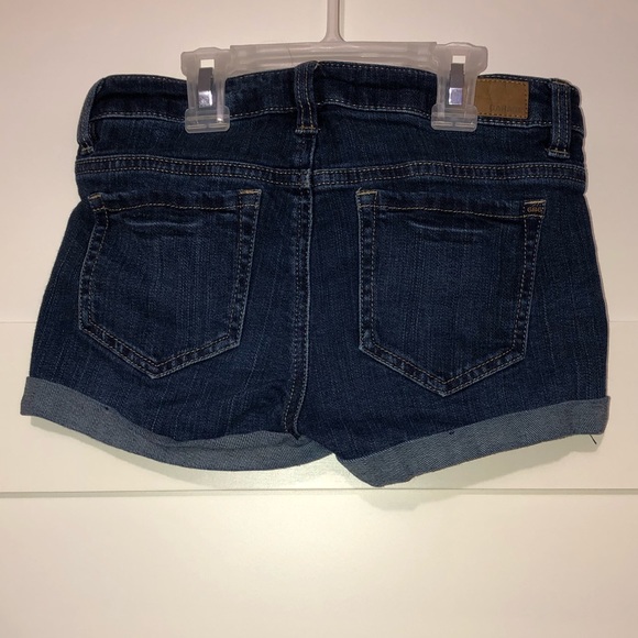 Dark wash denim shorts with rolled bottom - Picture 2 of 3